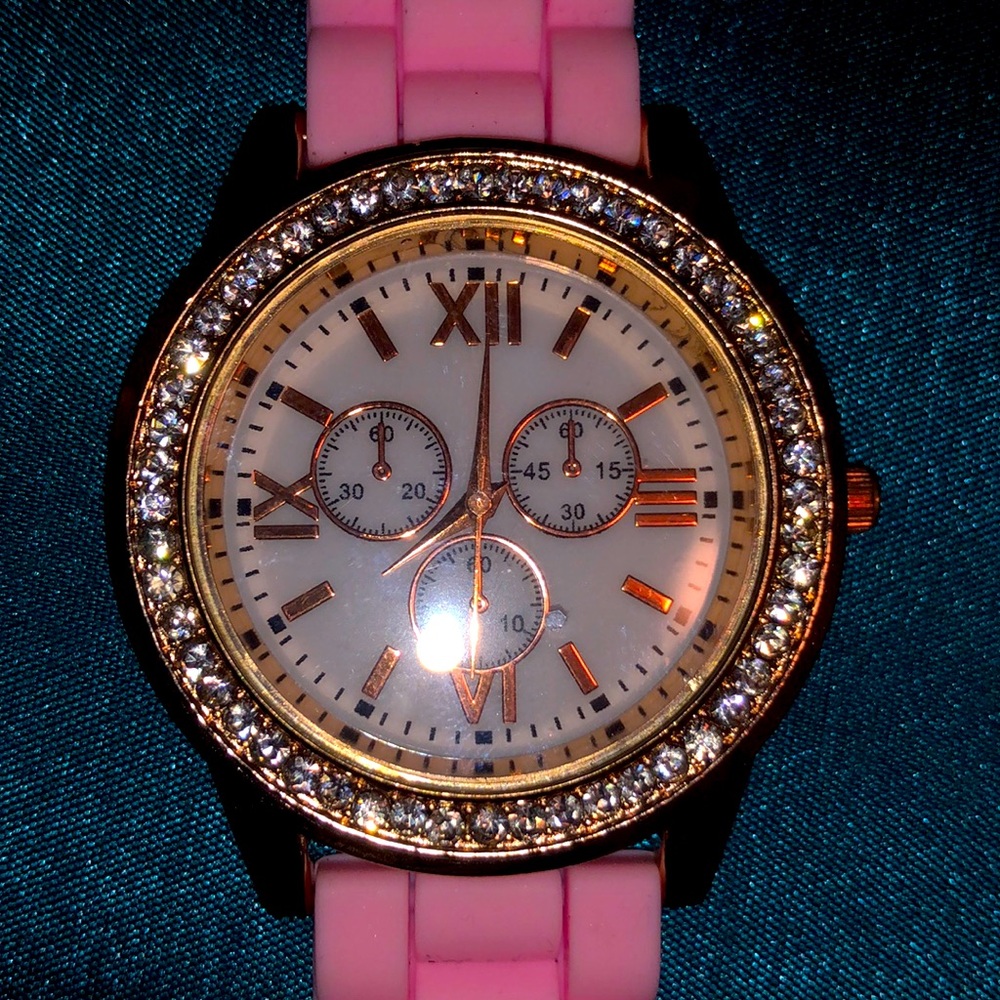 Light pink ladies crystal rose tone watch with 3 Dials.